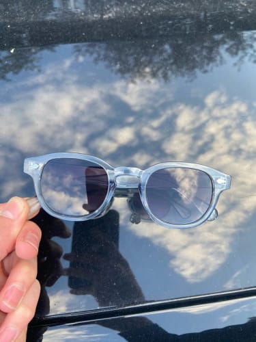 Hassan O. wearing sunglasses