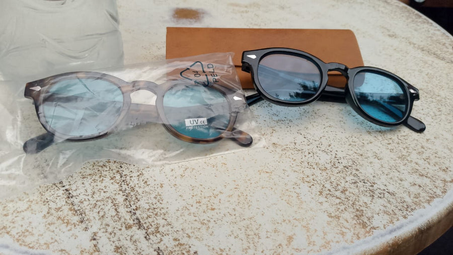 Othmane I. wearing sunglasses